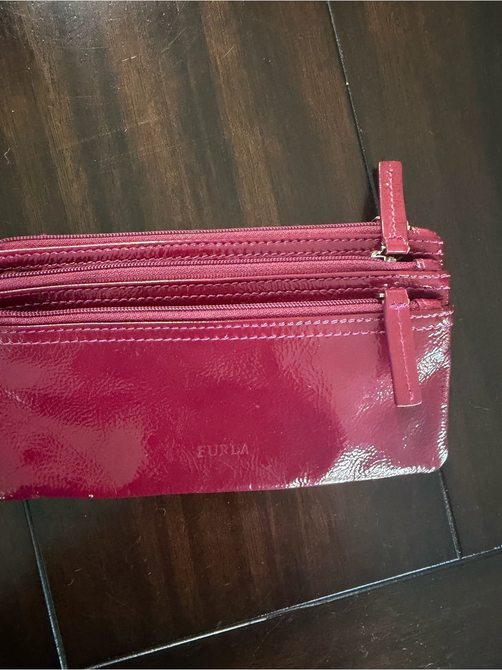 Furla Glossy Patent Zip Wallet in Deep Raspberry